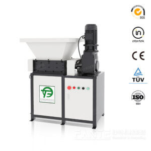 Mini shredder machine designed for paper, rubber, metal, and plastic recycling applications