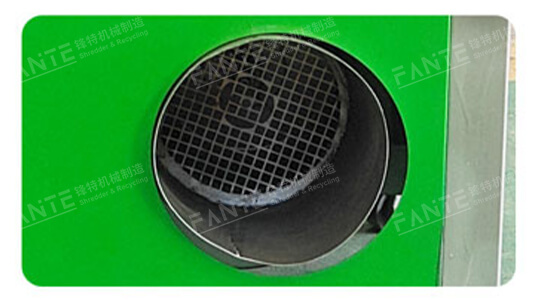 The mini copper wire granulator uses a fan to blow copper and plastic through a separation net. Heavier copper falls to the front outlet, while lighter plastic is blown to the rear.